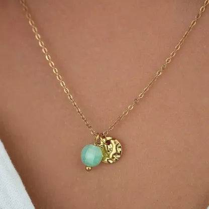 Collier jade et médaillon martelé